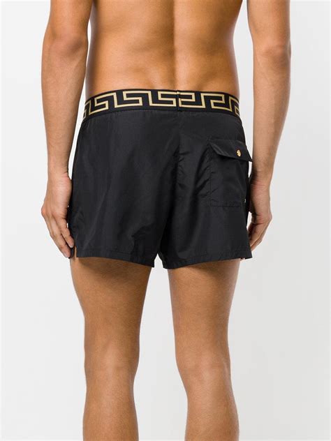 versace swim shorts black|More.